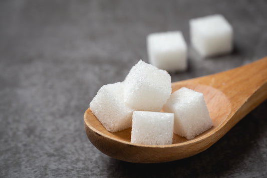 monk fruit sugar cubes on a spoon